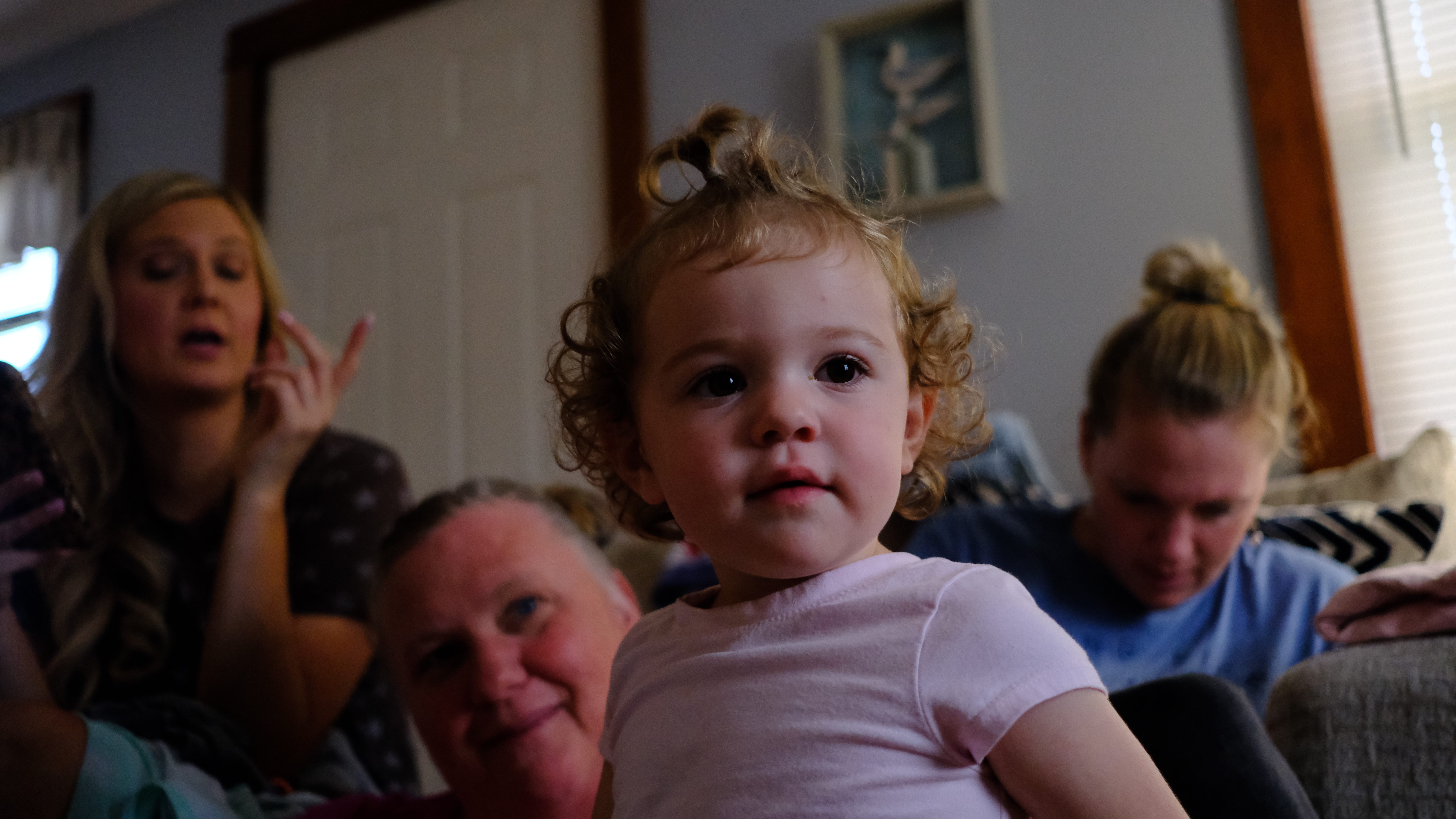 A generational candid photo of a family